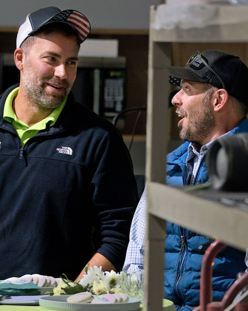 Rob Marconi and Cory Cochran talking at the McRae headquarters grand opening